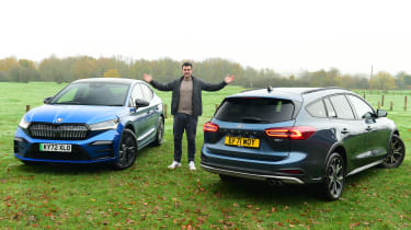 Ford Focus Long termer - Steve Walker standing between Skoda Enyaq iV and Ford Focus Estate